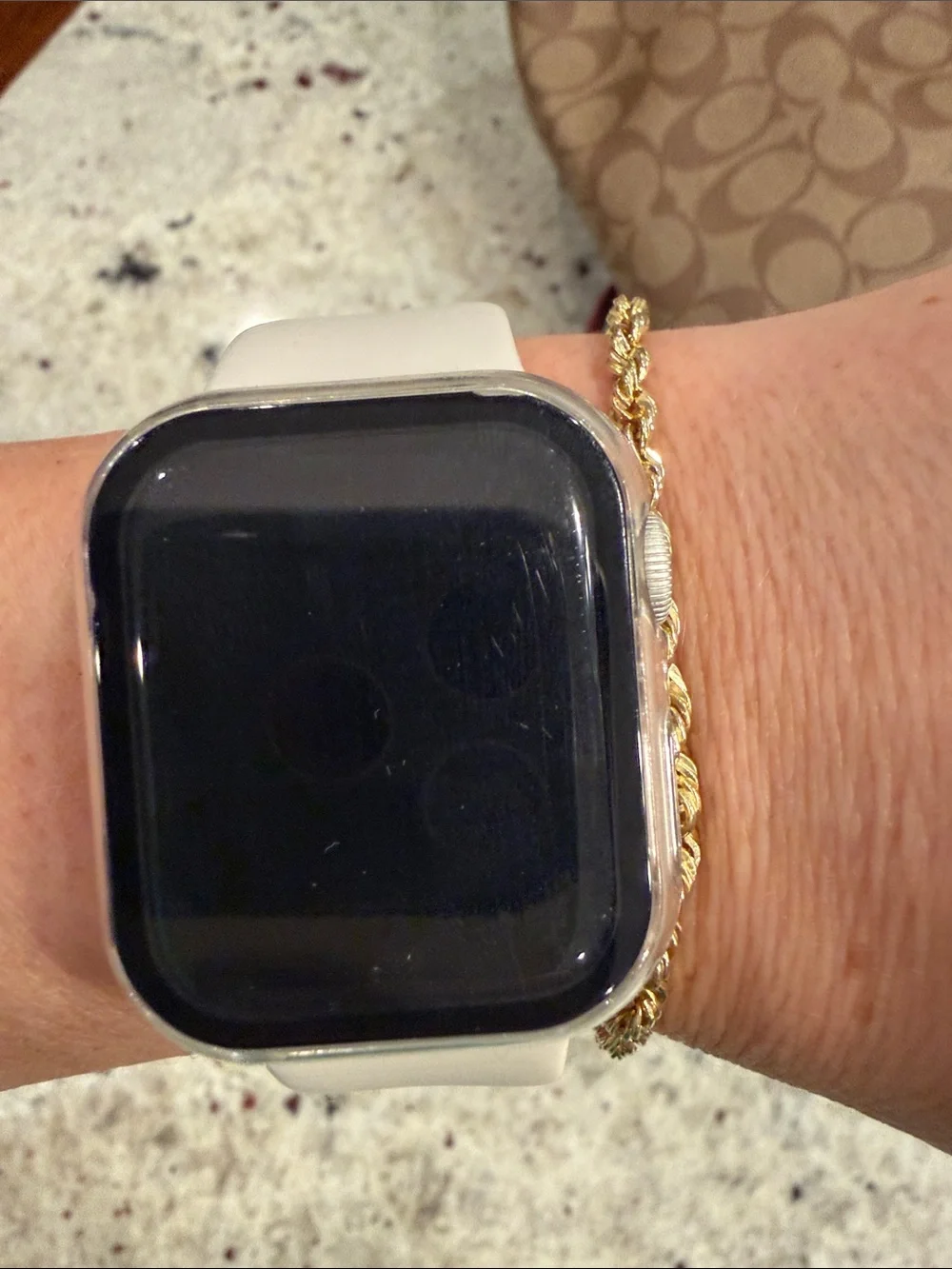 Apple Watch with Stone Silicone Band and White Charger